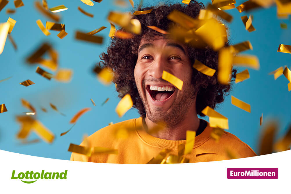 Bild zeigt einen Mann, der sich über seinen EuroMillionen Gewinn freut und goldene Konfetti 